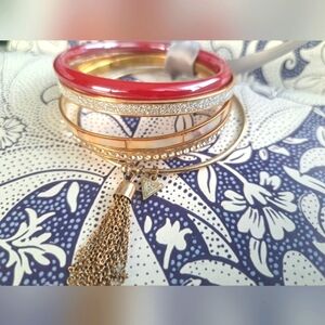 Set of 5 bracelets in gold and rich warms tones